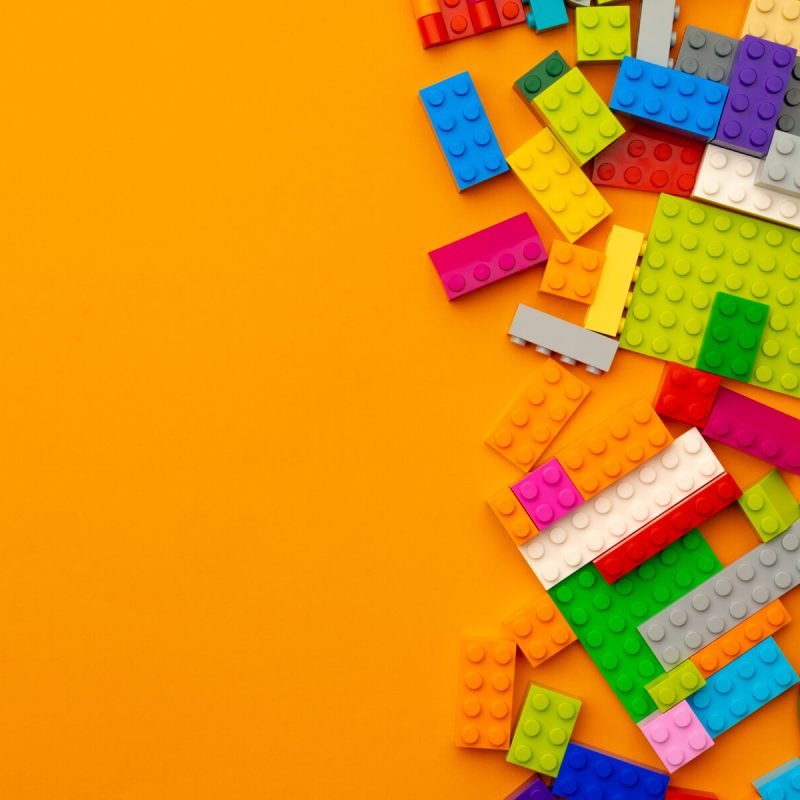 kids-toy-constructor-details-scattered-on-yellow-b-RTXQFQ4.jpg